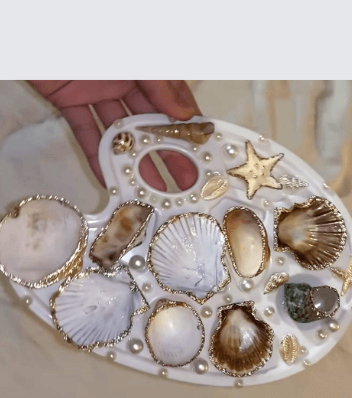 Shell jewelry tray with pearls and a starfish